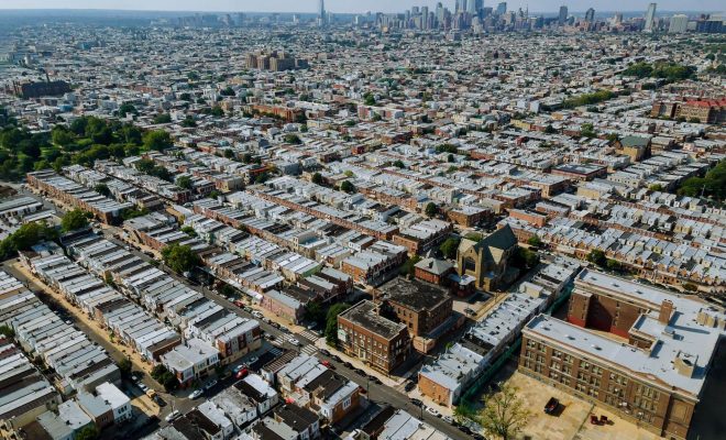 A look at the city Philadelphia skyline and the roofs of houses.