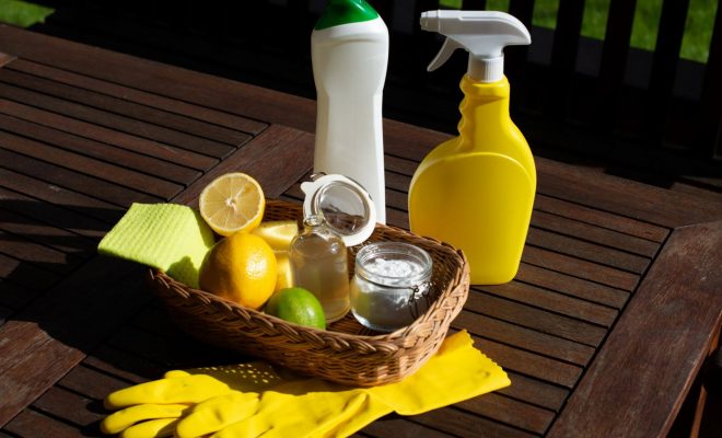 Cleaning supply bottles and the ingredients needed to do-it-yourself cleaning fluid.