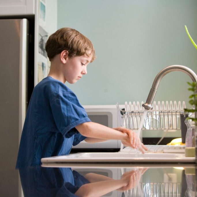 Child washing hands