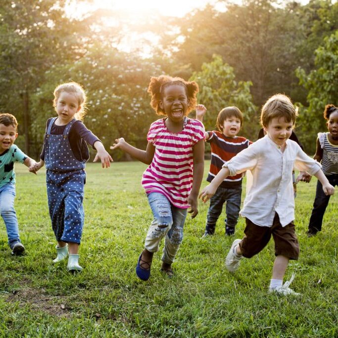 Group of kids playing in a park.